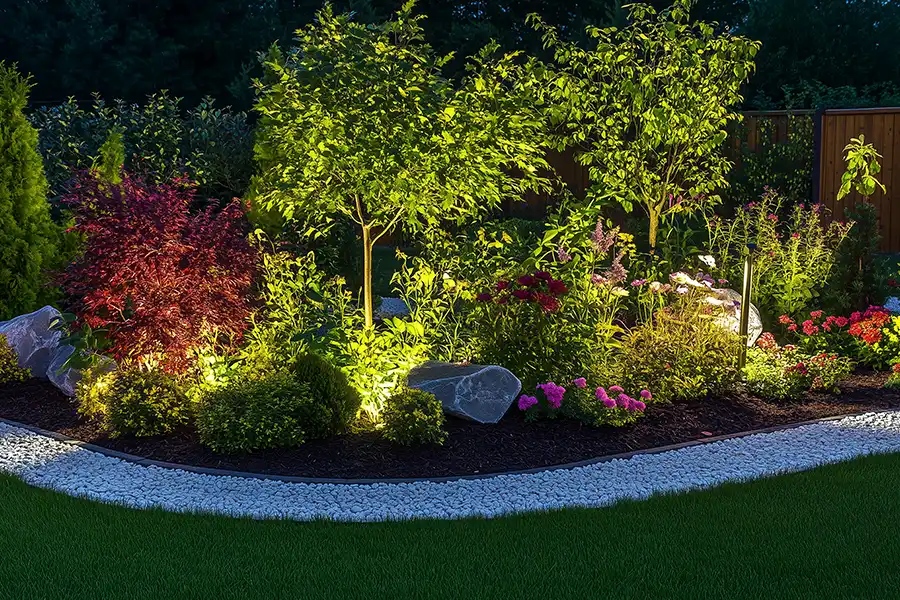 A-Unlimited Tree Service —A garden landscape with trees, flowers, and bushes in a yard in Edwardsville, IL.